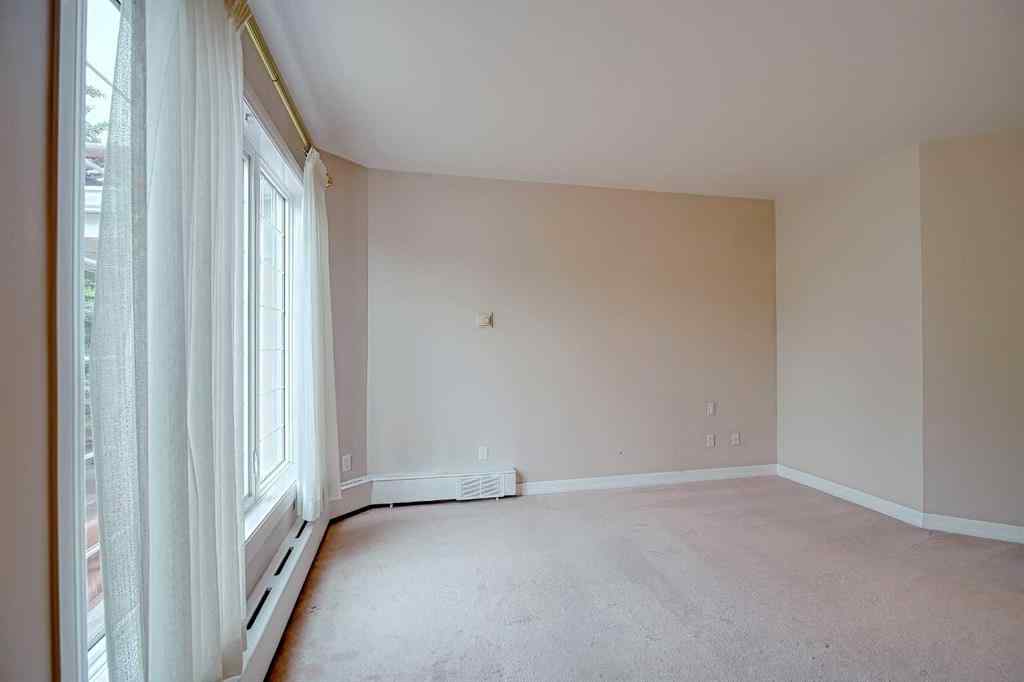 MLS® A2261461 - Unit #101 505 Canyon Meadows Drive SW in Canyon Meadows Calgary, Residential