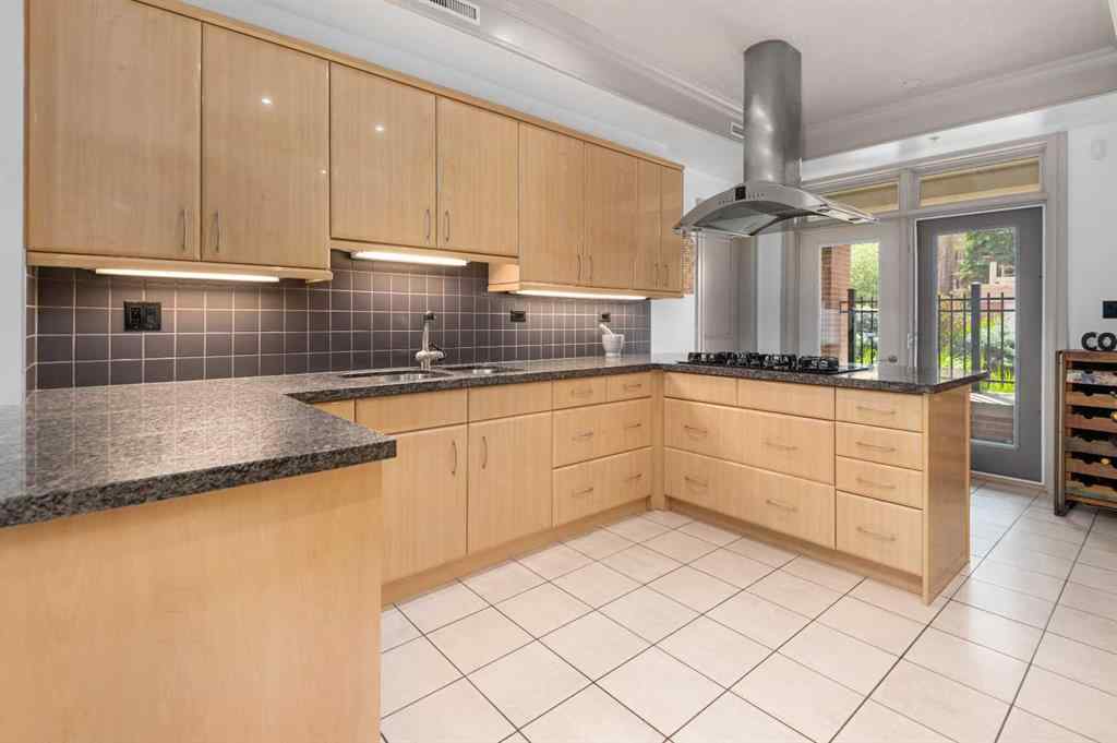 MLS® A2261502 - Unit #105 670 PRINCETON Way SW in Eau Claire Calgary, Residential