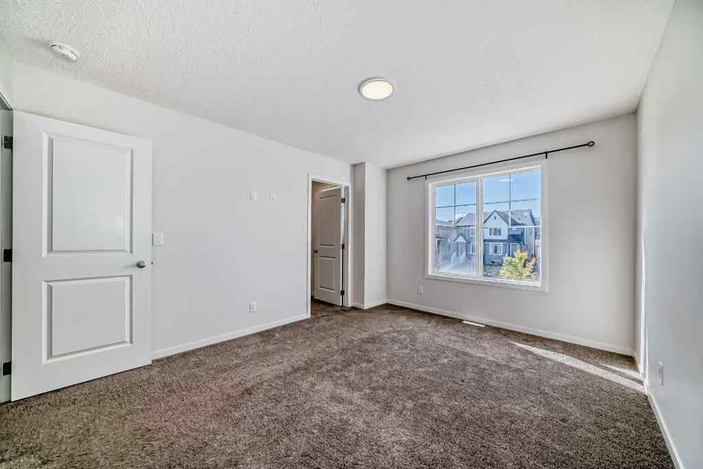 MLS® A2261503 - 36 Edith Gate NW in Glacier Ridge Calgary, Residential