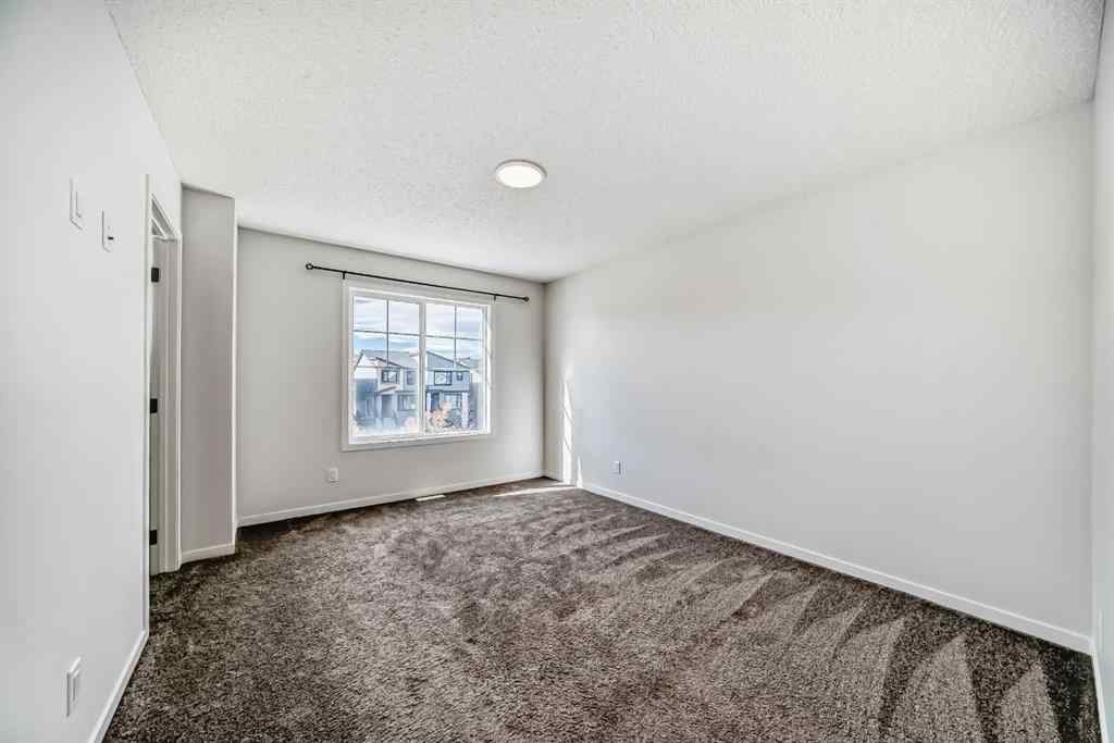 MLS® A2261503 - 36 Edith Gate NW in Glacier Ridge Calgary, Residential