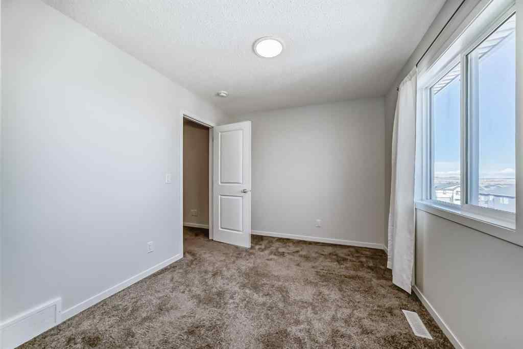 MLS® A2261503 - 36 Edith Gate NW in Glacier Ridge Calgary, Residential