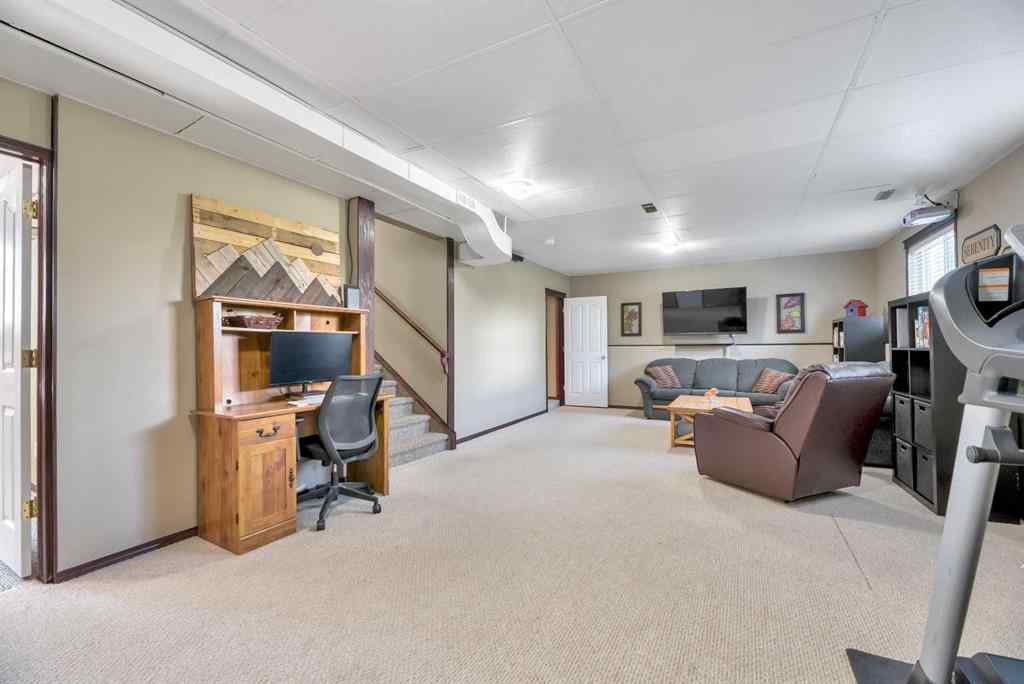 MLS® A2261576 - 102 Parklane Drive  in Aspen Creek Strathmore, Residential