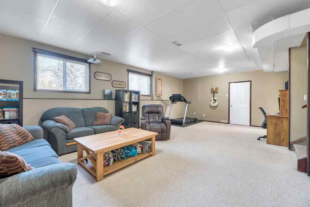 MLS® A2261576 - 102 Parklane Drive  in Aspen Creek Strathmore, Residential