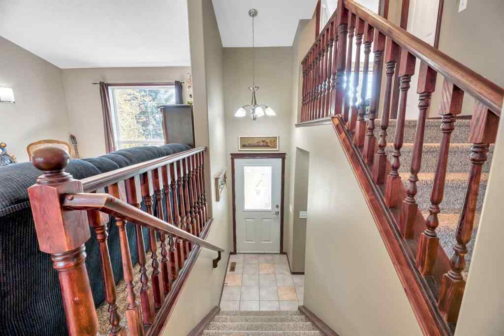 MLS® A2261576 - 102 Parklane Drive  in Aspen Creek Strathmore, Residential