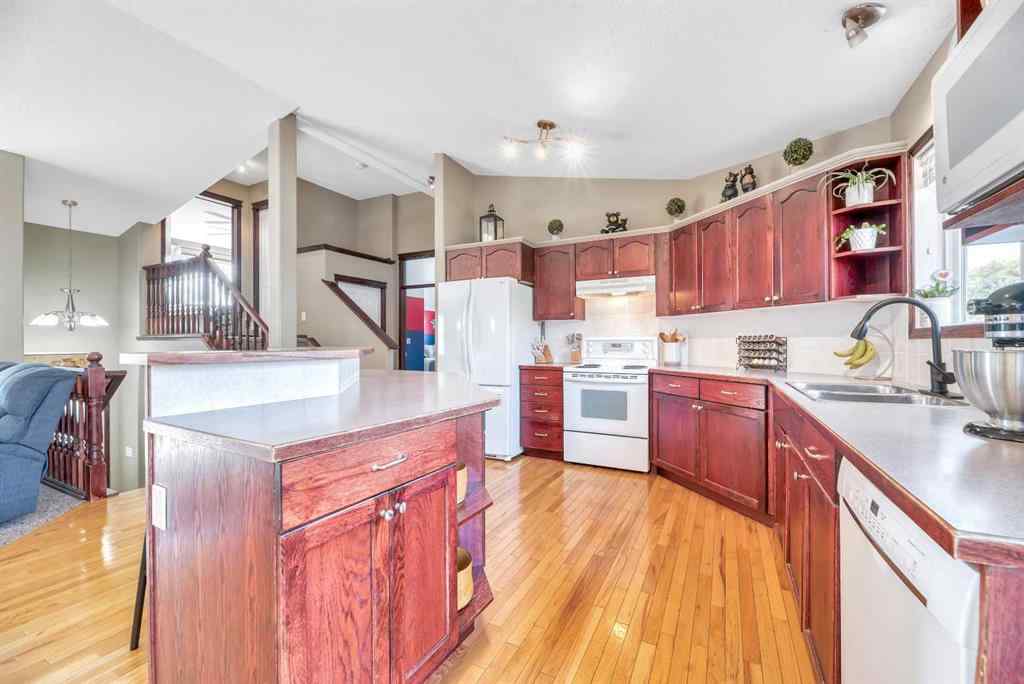 MLS® A2261576 - 102 Parklane Drive  in Aspen Creek Strathmore, Residential