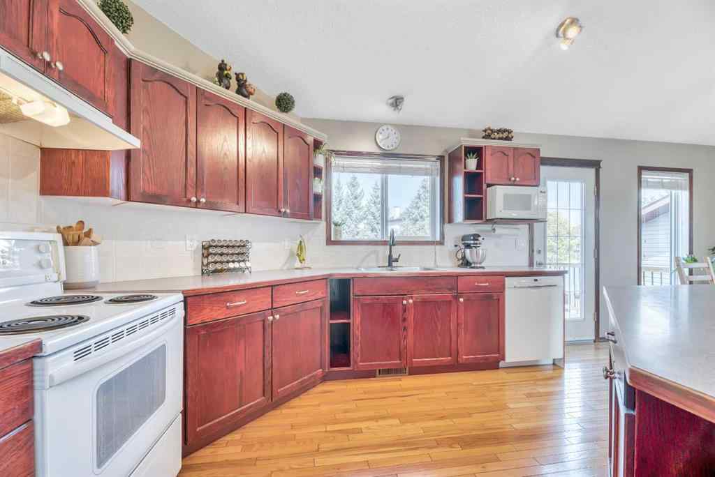 MLS® A2261576 - 102 Parklane Drive  in Aspen Creek Strathmore, Residential