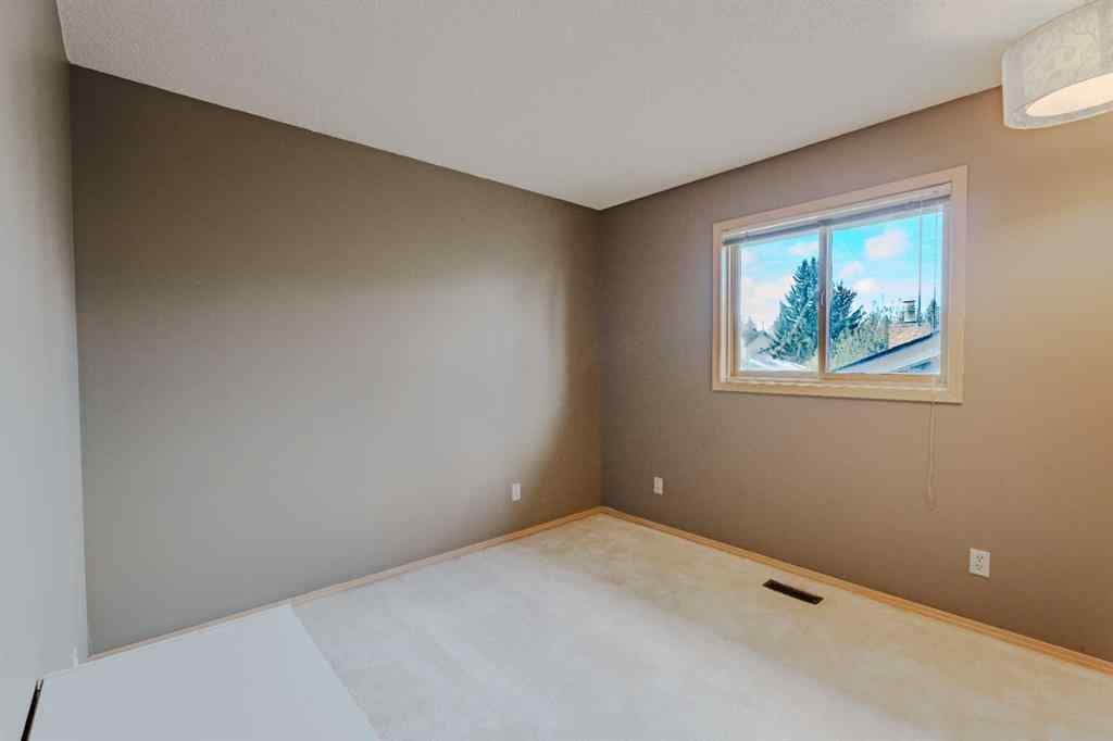 MLS® A2261577 - 135 Canterbury Court SW in Canyon Meadows Calgary, Residential