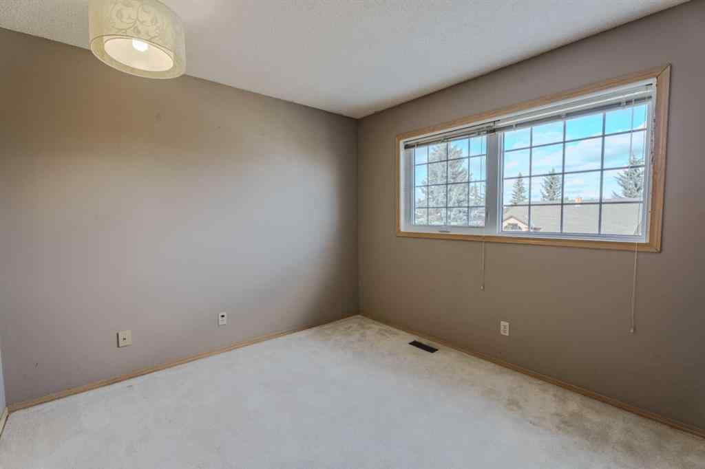 MLS® A2261577 - 135 Canterbury Court SW in Canyon Meadows Calgary, Residential