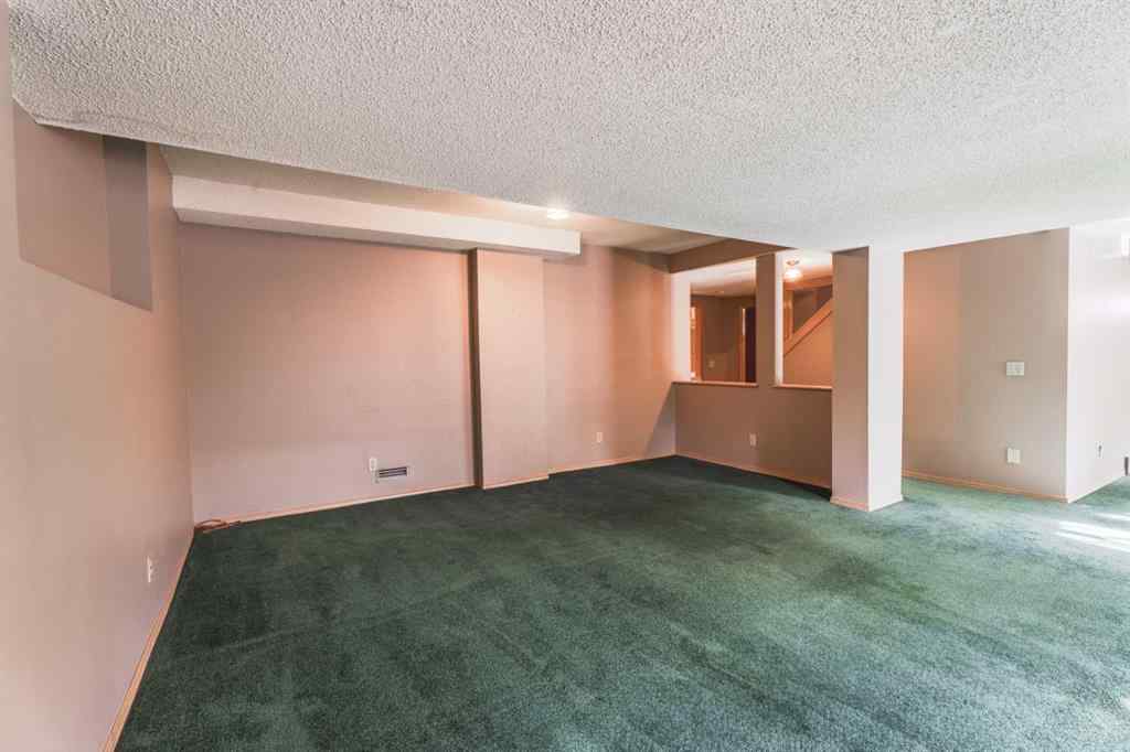 MLS® A2261577 - 135 Canterbury Court SW in Canyon Meadows Calgary, Residential