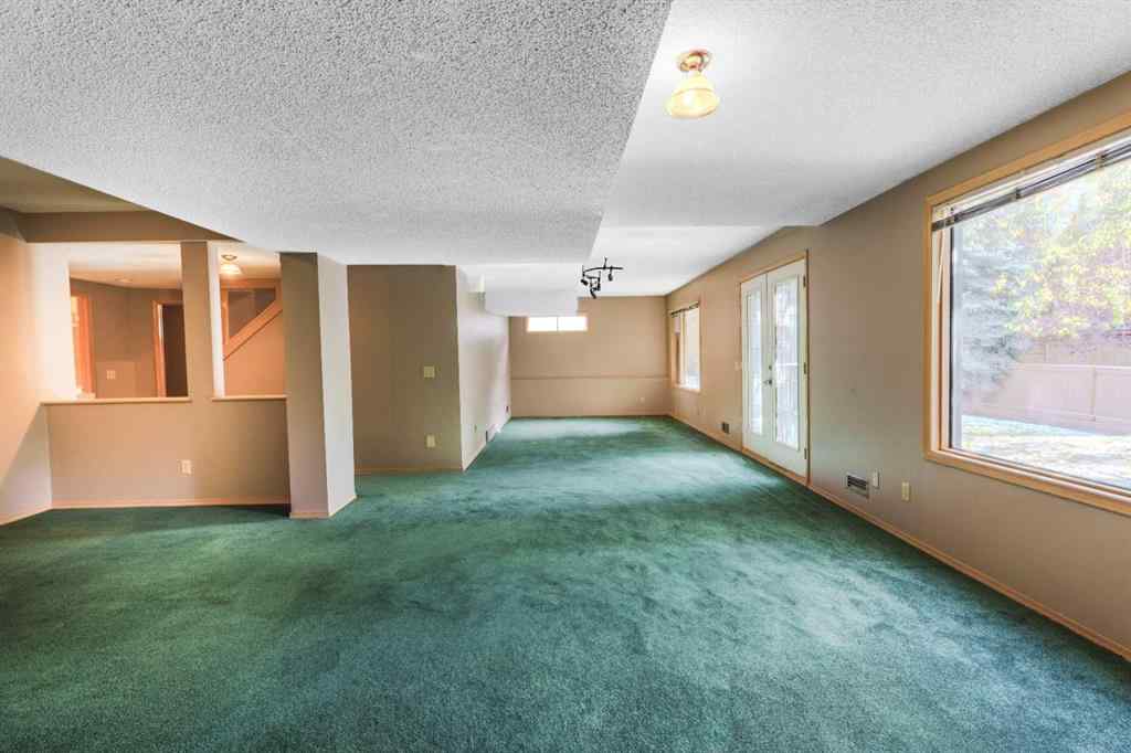 MLS® A2261577 - 135 Canterbury Court SW in Canyon Meadows Calgary, Residential