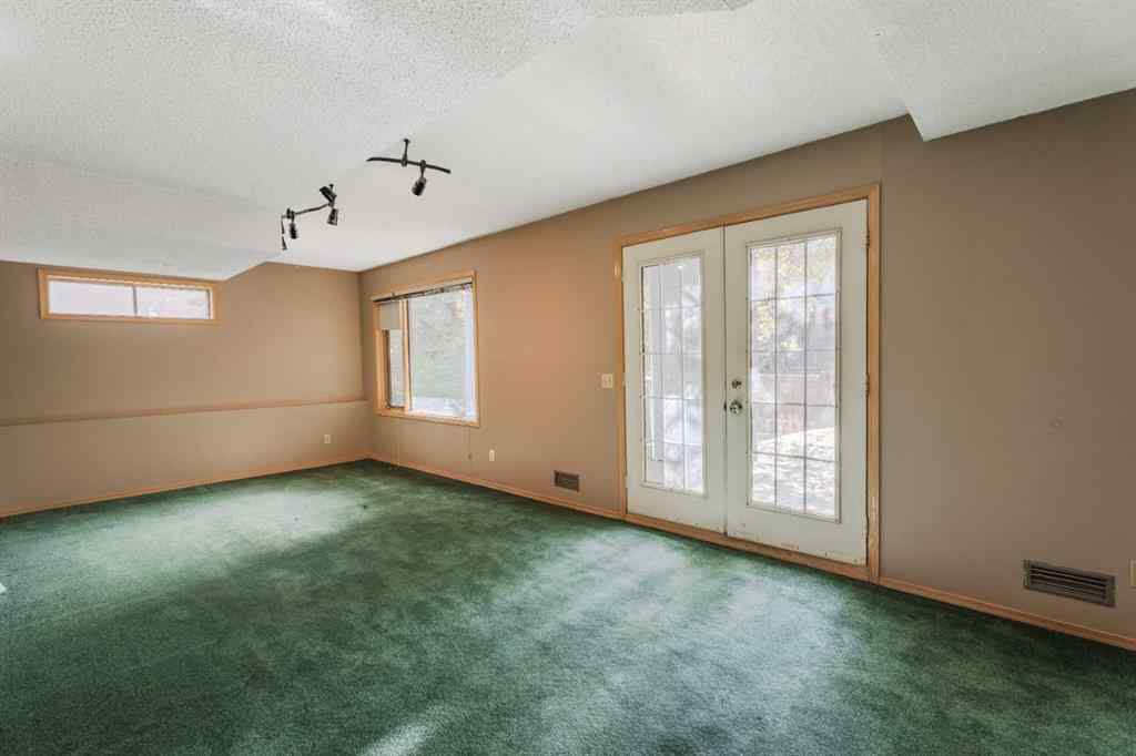 MLS® A2261577 - 135 Canterbury Court SW in Canyon Meadows Calgary, Residential