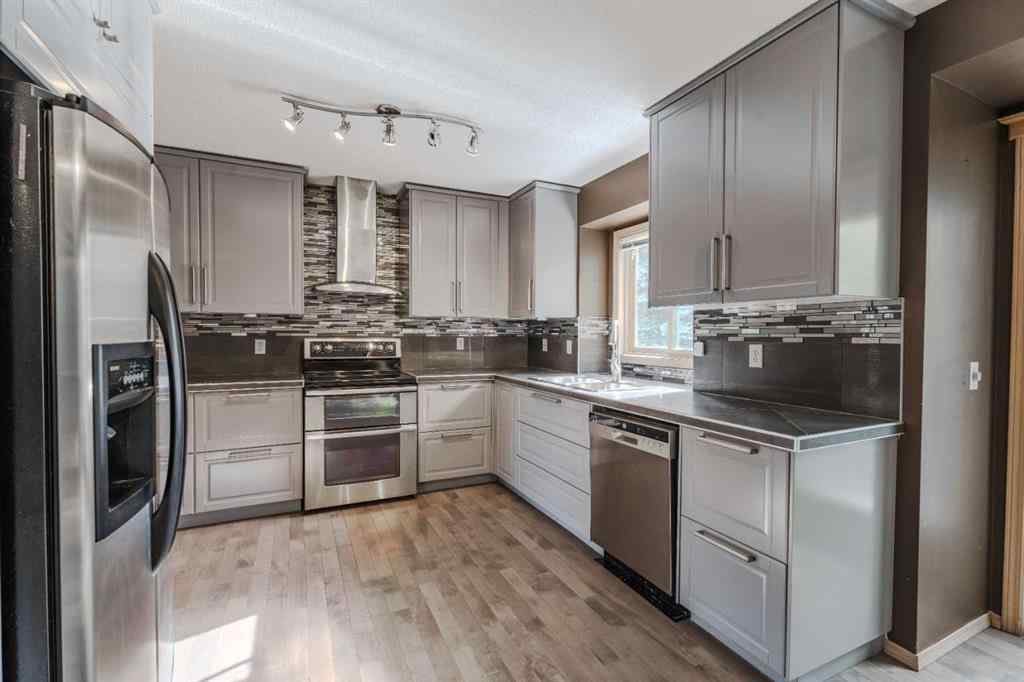 MLS® A2261577 - 135 Canterbury Court SW in Canyon Meadows Calgary, Residential