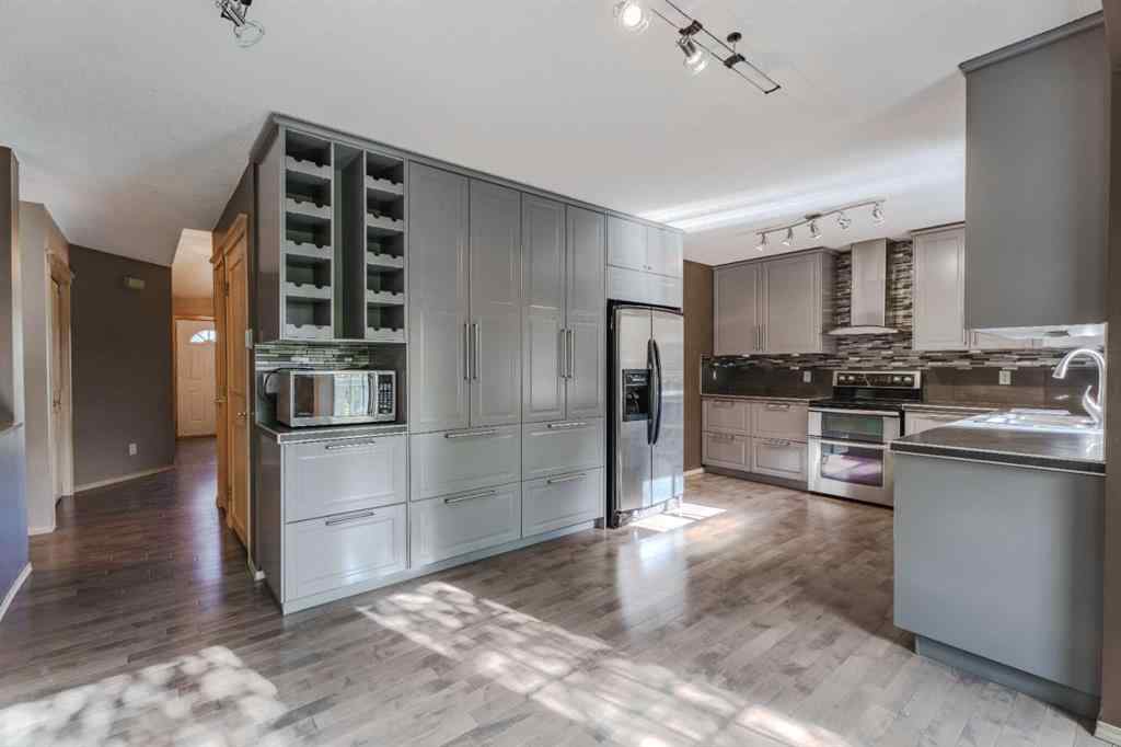 MLS® A2261577 - 135 Canterbury Court SW in Canyon Meadows Calgary, Residential