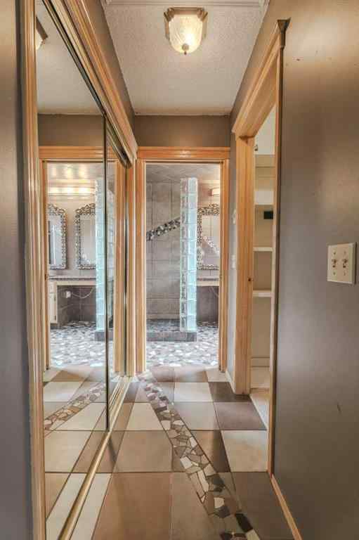 MLS® A2261577 - 135 Canterbury Court SW in Canyon Meadows Calgary, Residential