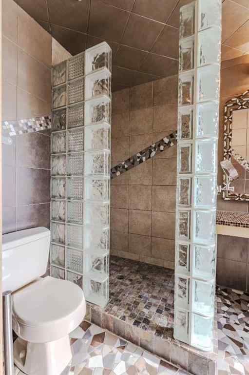 MLS® A2261577 - 135 Canterbury Court SW in Canyon Meadows Calgary, Residential