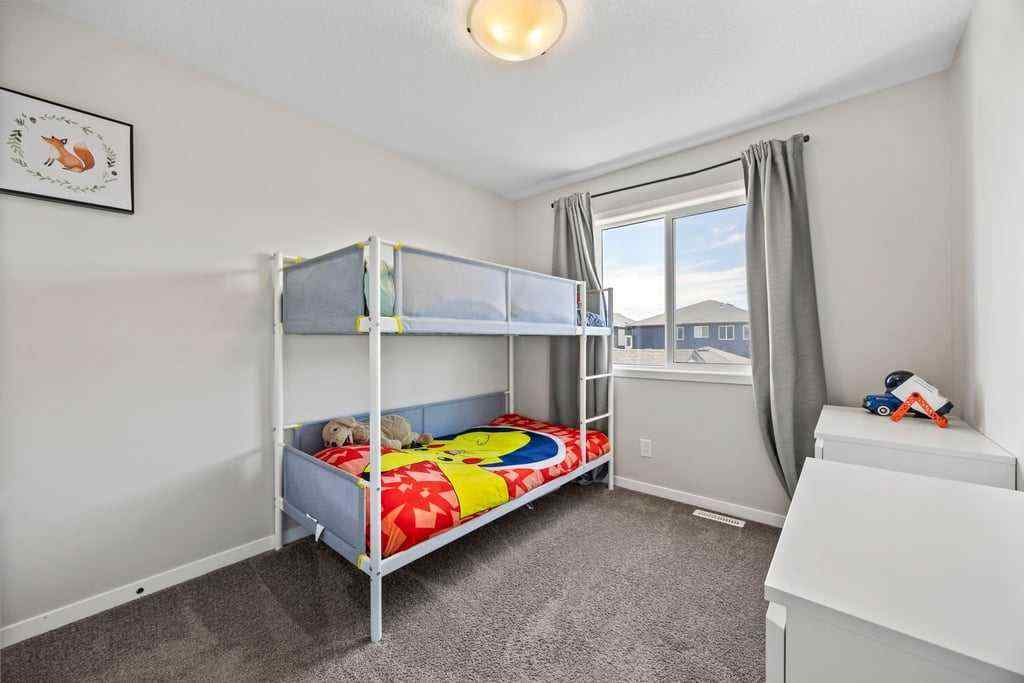 MLS® A2261581 - 42 Wolf Creek Manor SE in Wolf Willow Calgary, Residential