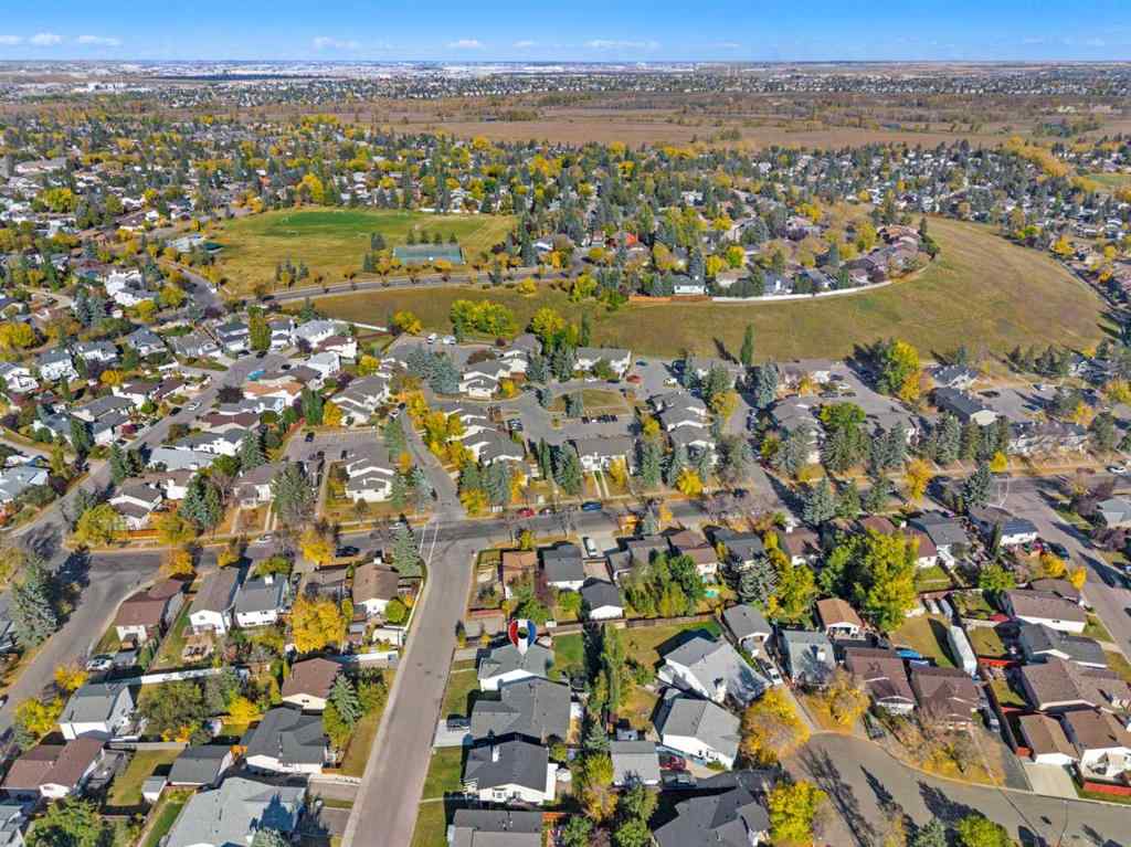 MLS® A2261610 - 11 Deerfield Circle SE in Deer Ridge Calgary, Residential