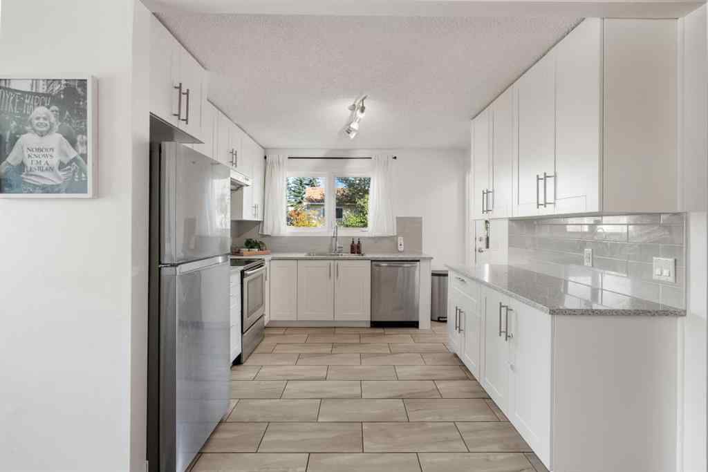 MLS® A2261610 - 11 Deerfield Circle SE in Deer Ridge Calgary, Residential