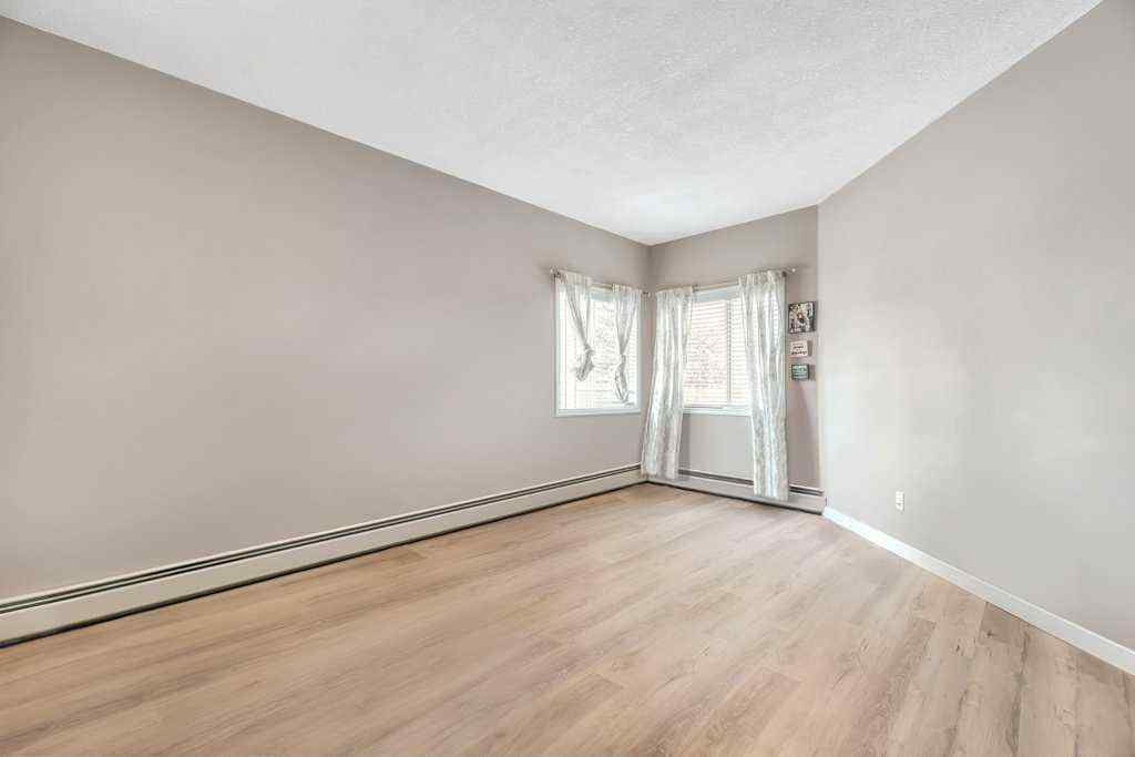 MLS® A2261617 - Unit #102 3 Parklane Way  in Downtown_Strathmore Strathmore, Residential