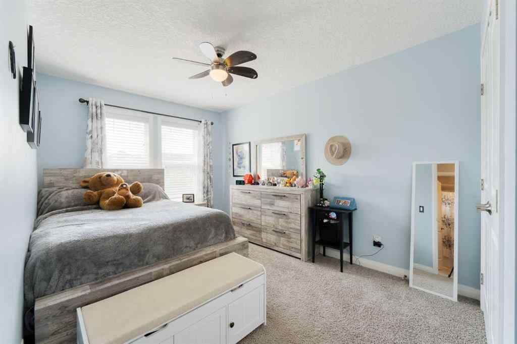 MLS® A2261620 - 49 Sunset Manor  in Sunset Ridge Cochrane, Residential