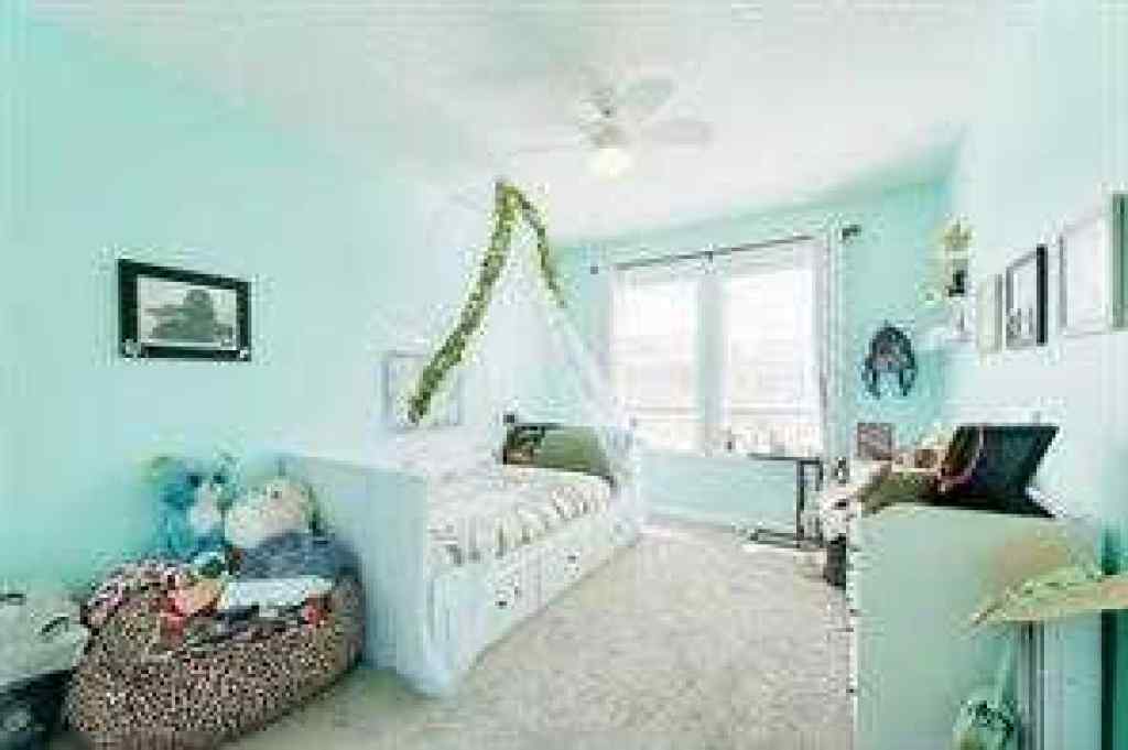 MLS® A2261620 - 49 Sunset Manor  in Sunset Ridge Cochrane, Residential