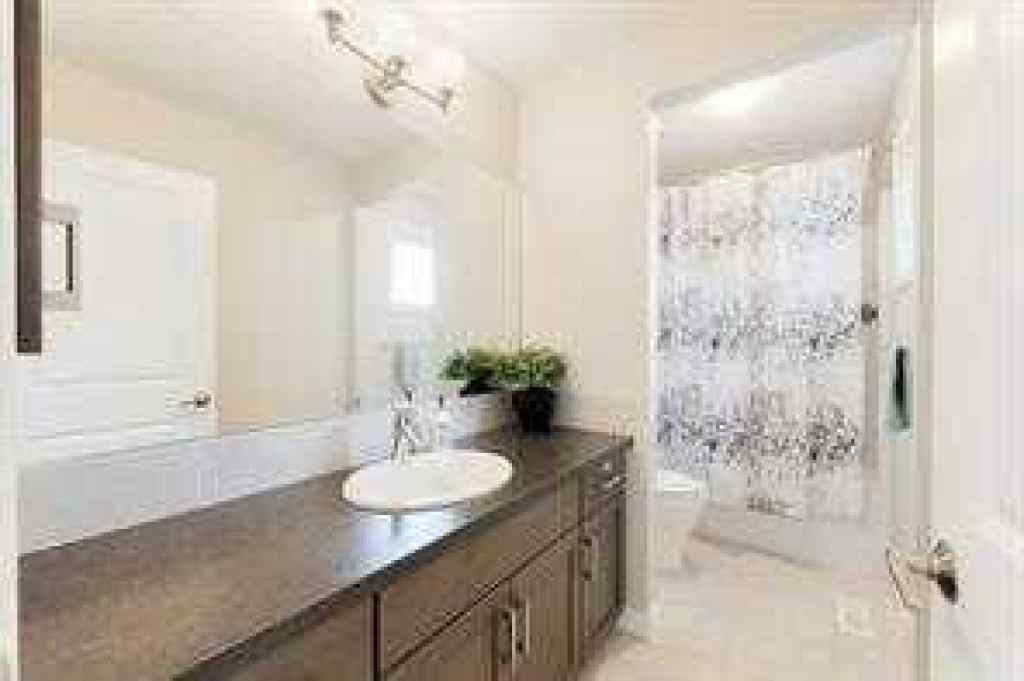 MLS® A2261620 - 49 Sunset Manor  in Sunset Ridge Cochrane, Residential