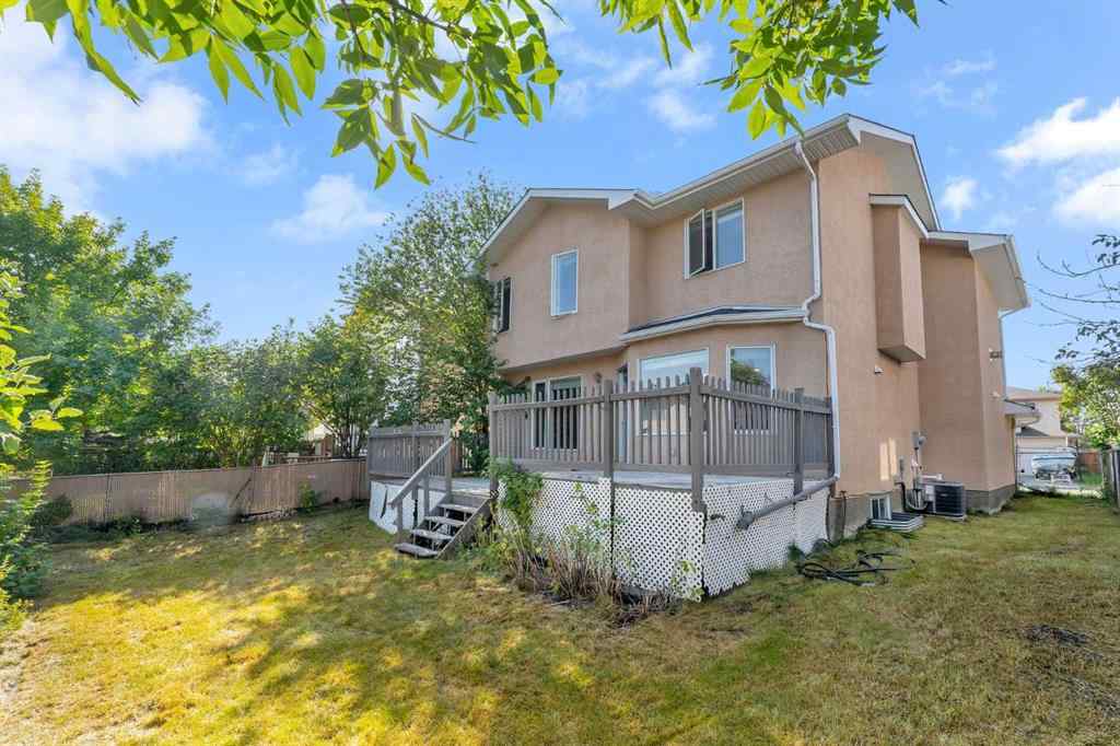 MLS® A2261621 - 22 Cimarron Crescent  in Cimarron Okotoks, Residential