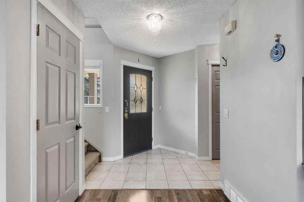 MLS® A2261621 - 22 Cimarron Crescent  in Cimarron Okotoks, Residential