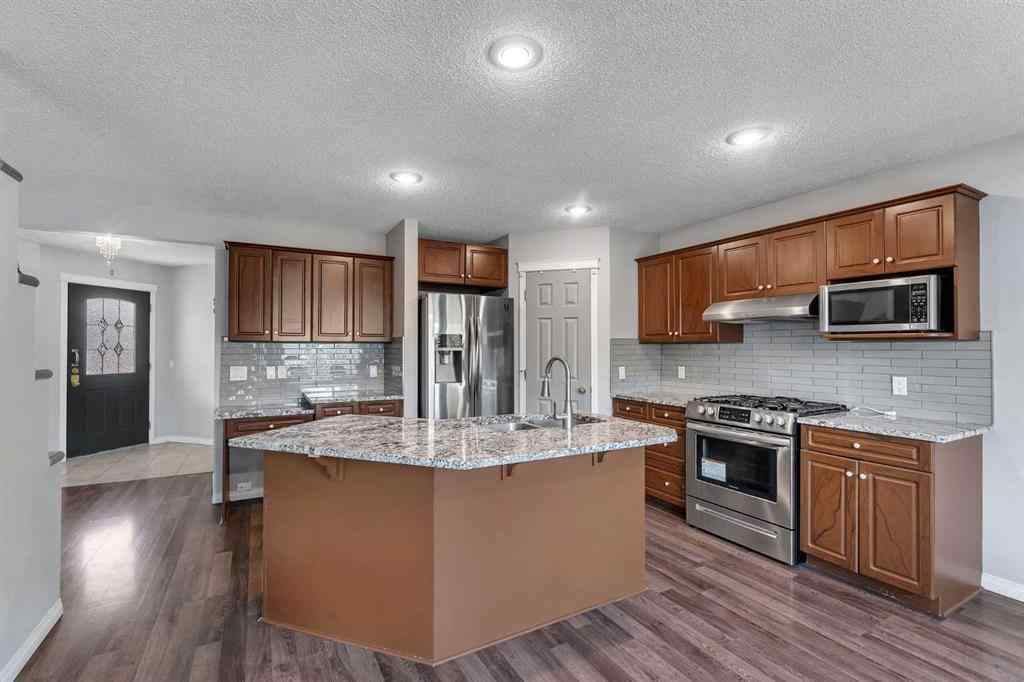 MLS® A2261621 - 22 Cimarron Crescent  in Cimarron Okotoks, Residential