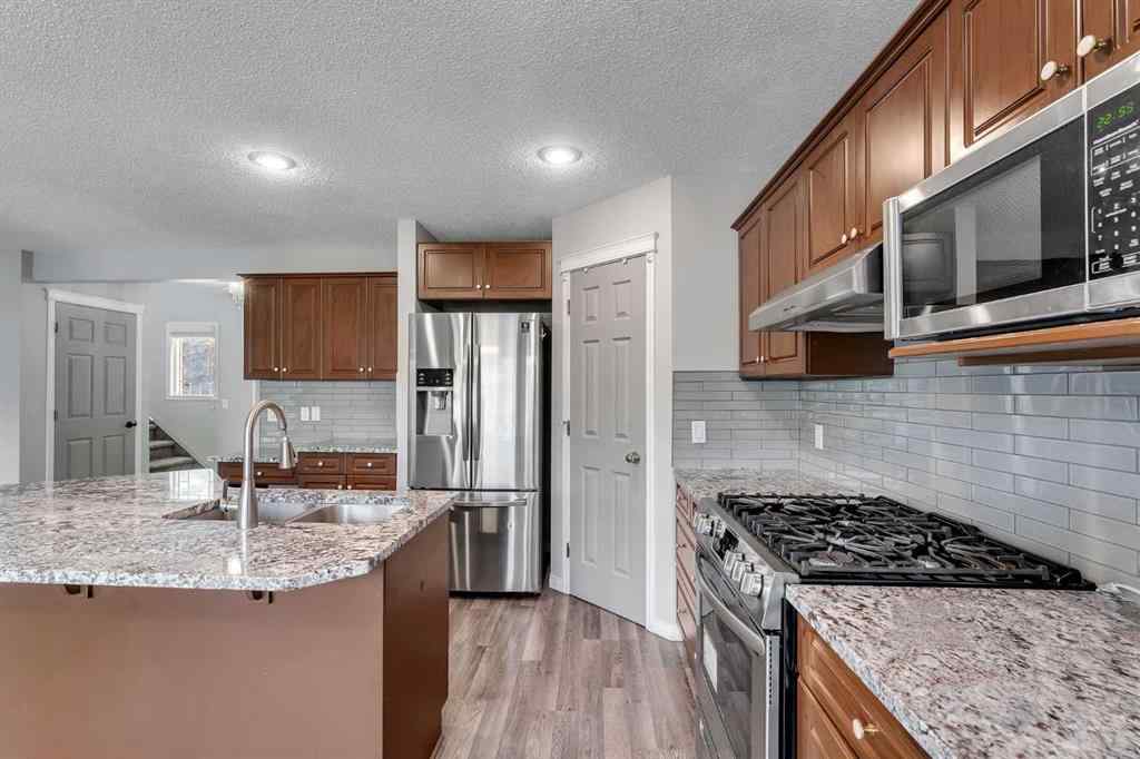 MLS® A2261621 - 22 Cimarron Crescent  in Cimarron Okotoks, Residential