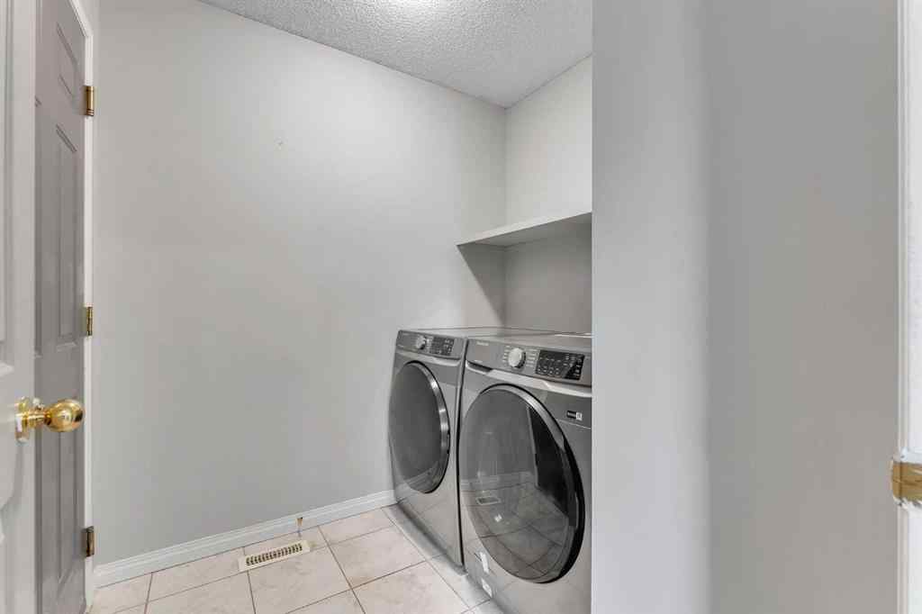 MLS® A2261621 - 22 Cimarron Crescent  in Cimarron Okotoks, Residential