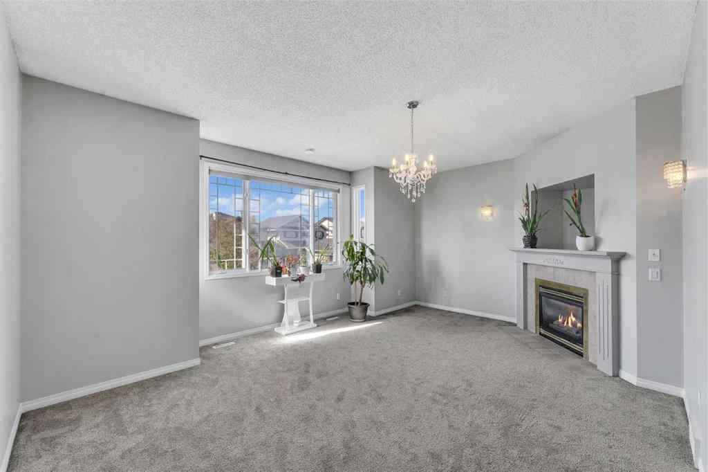 MLS® A2261621 - 22 Cimarron Crescent  in Cimarron Okotoks, Residential
