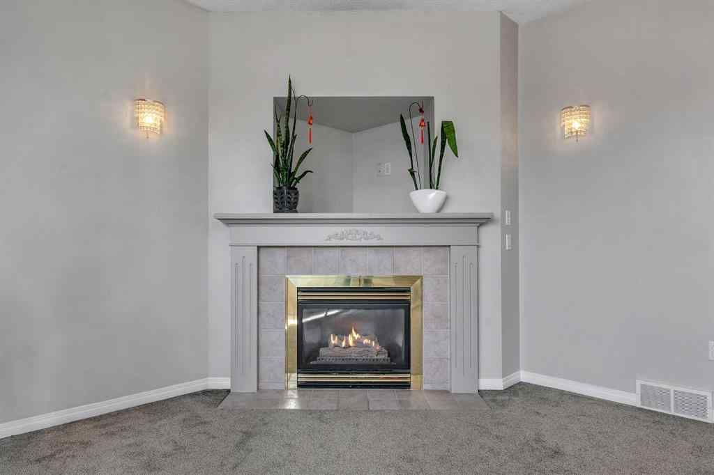 MLS® A2261621 - 22 Cimarron Crescent  in Cimarron Okotoks, Residential