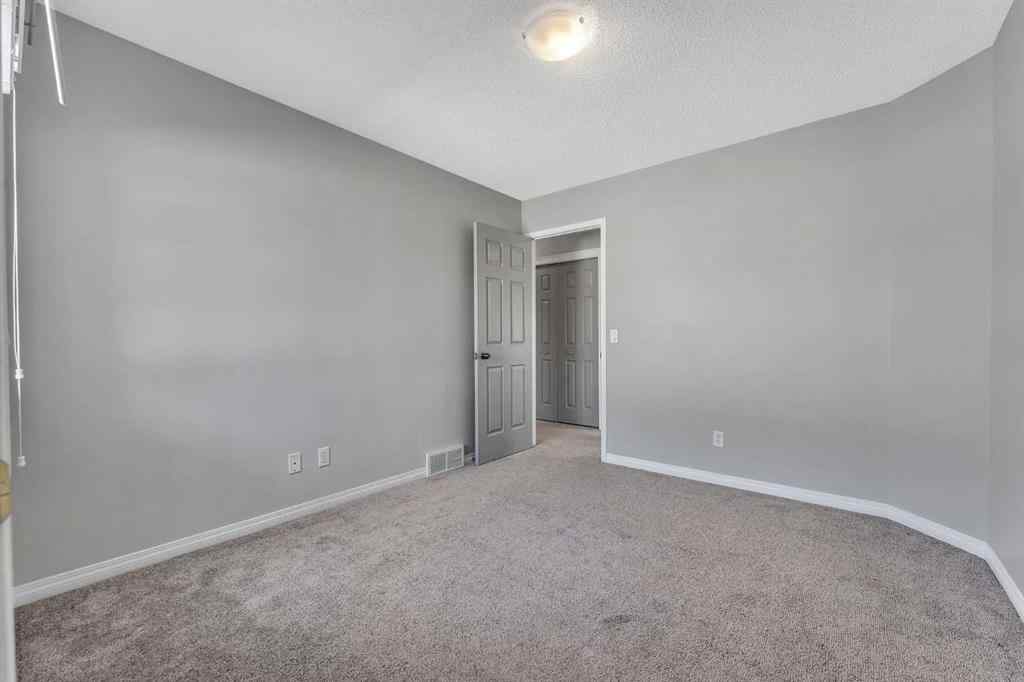 MLS® A2261621 - 22 Cimarron Crescent  in Cimarron Okotoks, Residential