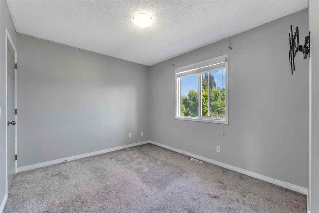 MLS® A2261621 - 22 Cimarron Crescent  in Cimarron Okotoks, Residential