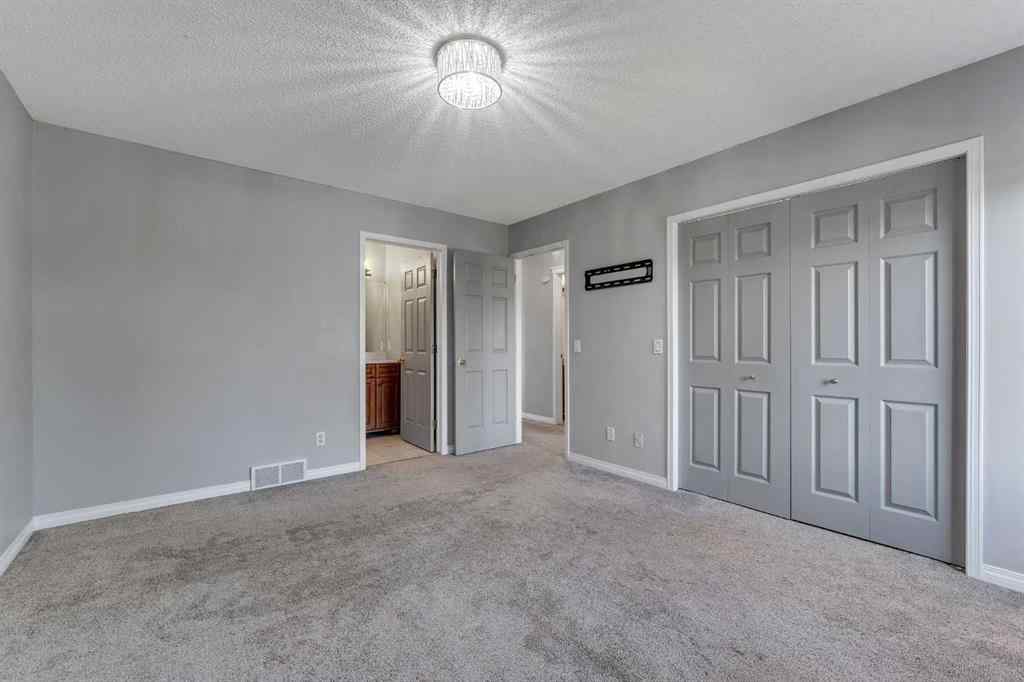 MLS® A2261621 - 22 Cimarron Crescent  in Cimarron Okotoks, Residential