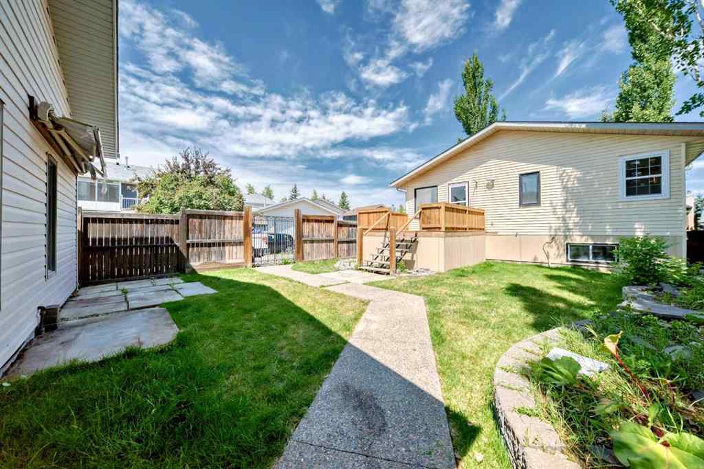 MLS® A2261623 - 77 Shawfield Way SW in Shawnessy Calgary, Residential