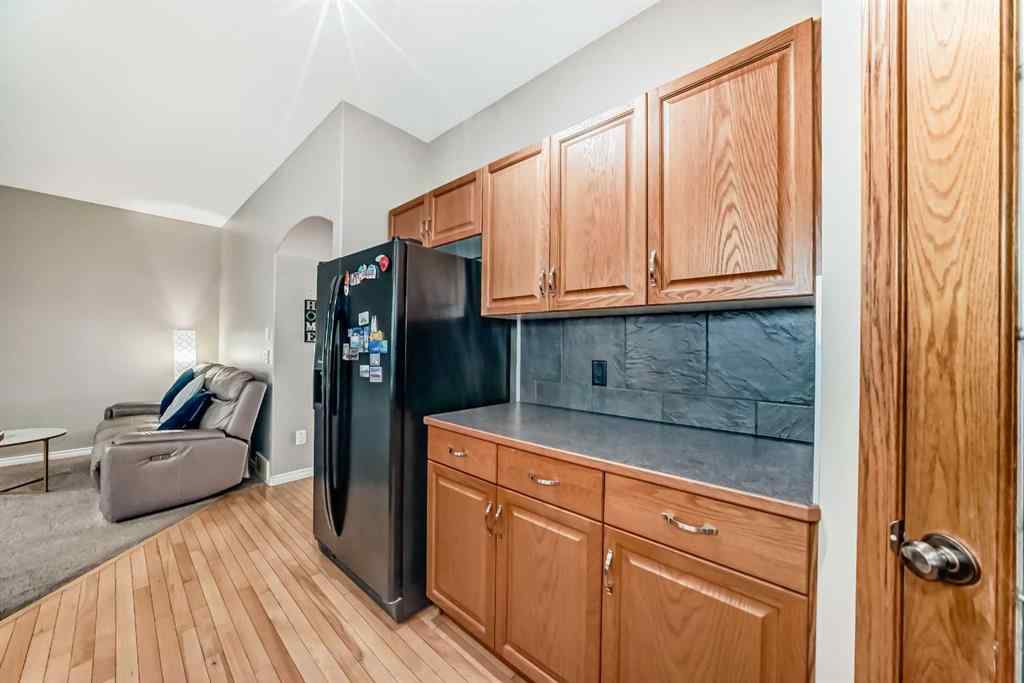 MLS® A2261634 - Unit #116 100 Coopers Common SW in Coopers Crossing Airdrie, Residential