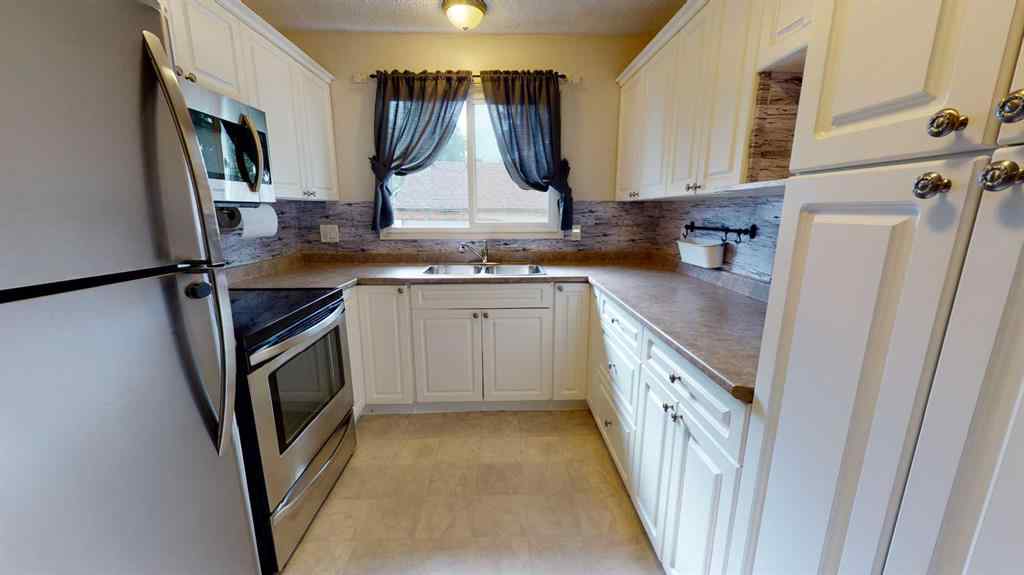 MLS&reg; # A2261638 - Unit #A & B 9507 104 Avenue  in Hillside Grande Prairie, Residential Open Houses