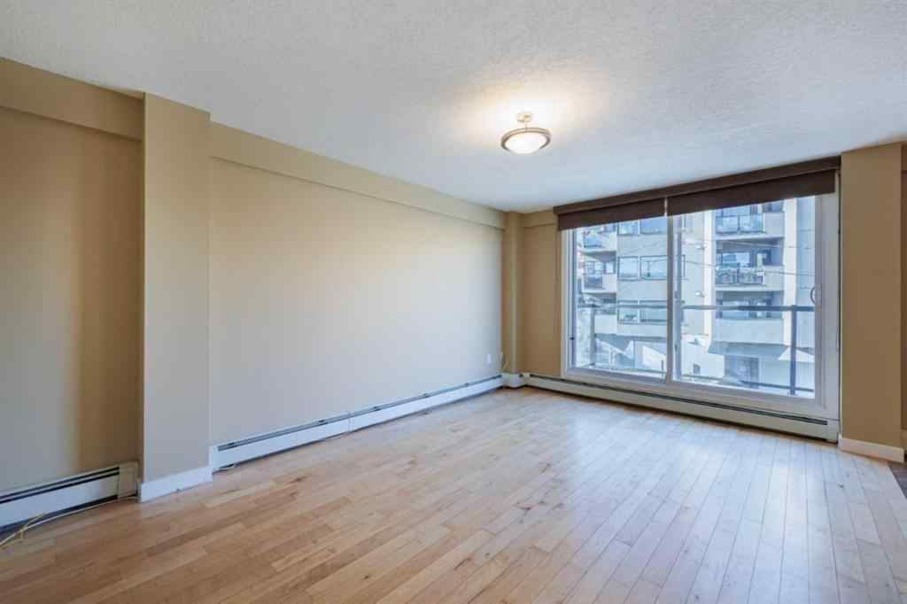 MLS® A2261656 - Unit #10 1715 13 Street SW in Lower Mount Royal Calgary, Residential