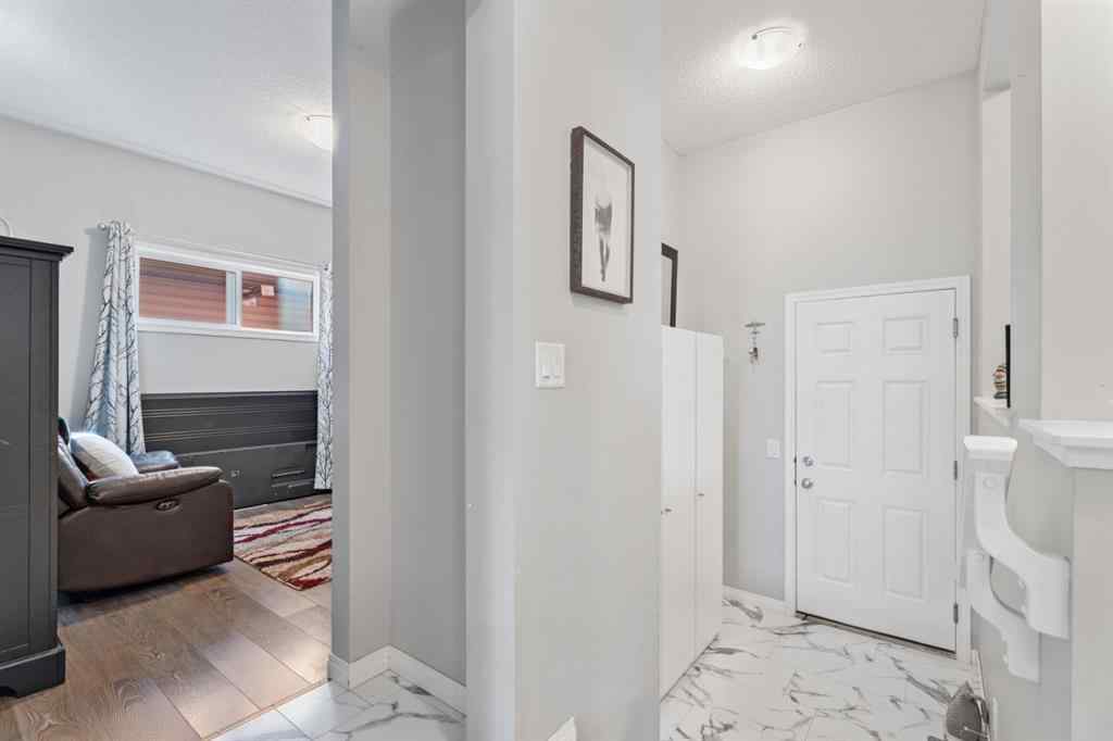 MLS® A2261663 - 178 Buckskin Way  in Heartland Cochrane, Residential