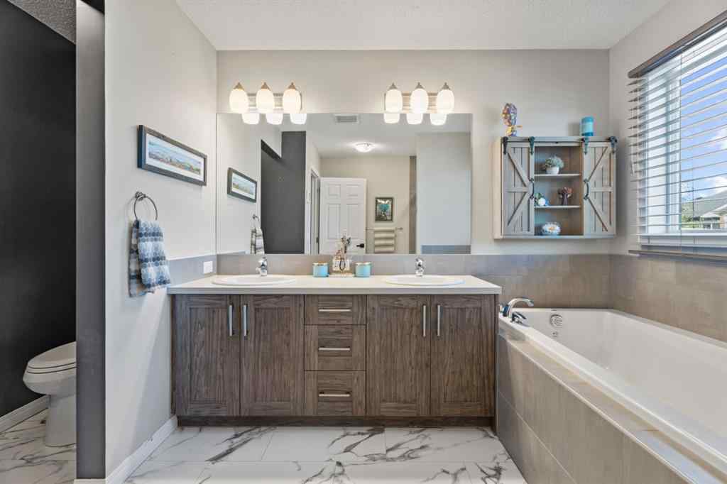 MLS® A2261663 - 178 Buckskin Way  in Heartland Cochrane, Residential