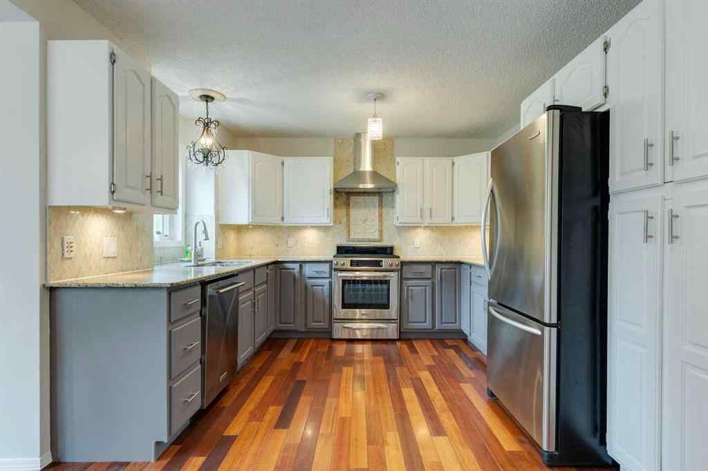 MLS® A2261673 - 2208 Sirocco Drive SW in Signal Hill Calgary, Residential