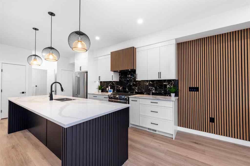 MLS® A2261674 - 2402 Westmount Road NW in West Hillhurst Calgary, Residential