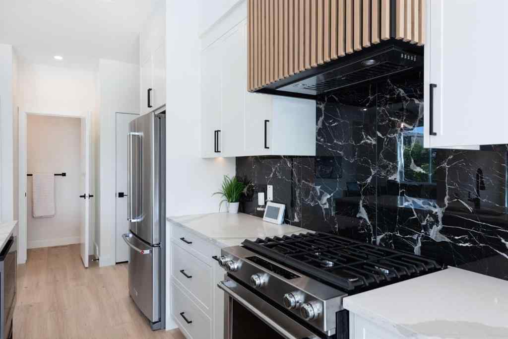 MLS® A2261674 - 2402 Westmount Road NW in West Hillhurst Calgary, Residential