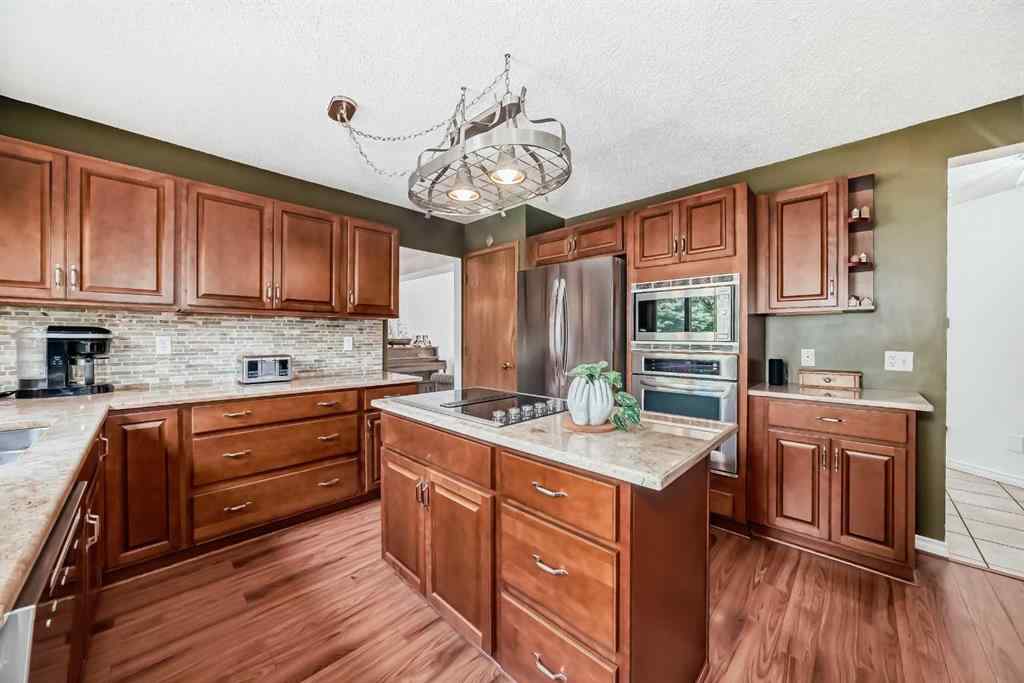 MLS® A2261675 - 164 Woodfield Road SW in Woodbine Calgary, Residential