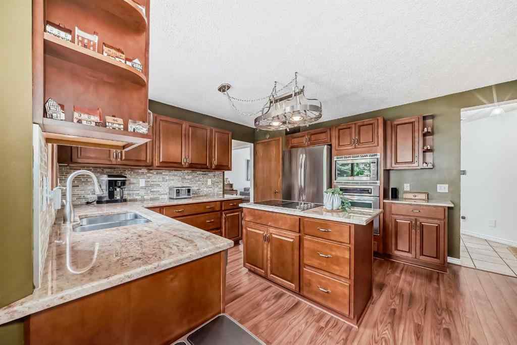 MLS® A2261675 - 164 Woodfield Road SW in Woodbine Calgary, Residential