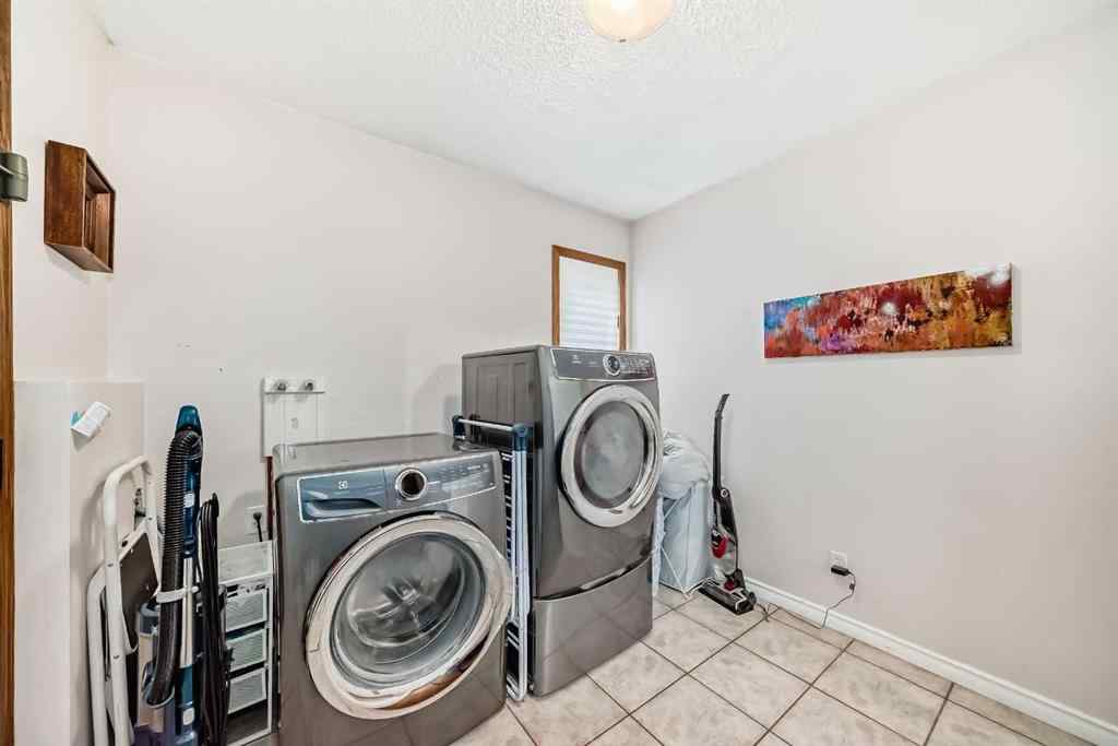 MLS® A2261675 - 164 Woodfield Road SW in Woodbine Calgary, Residential