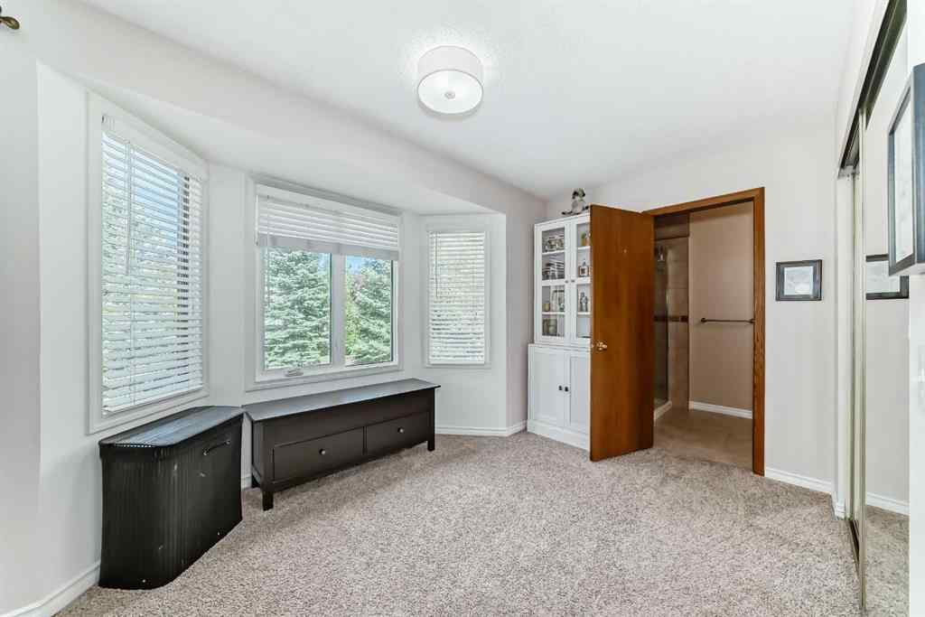 MLS® A2261675 - 164 Woodfield Road SW in Woodbine Calgary, Residential