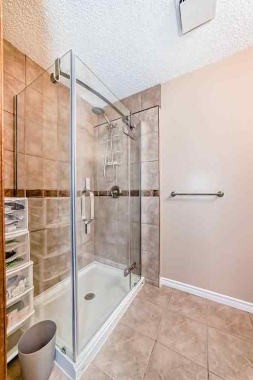 MLS® A2261675 - 164 Woodfield Road SW in Woodbine Calgary, Residential